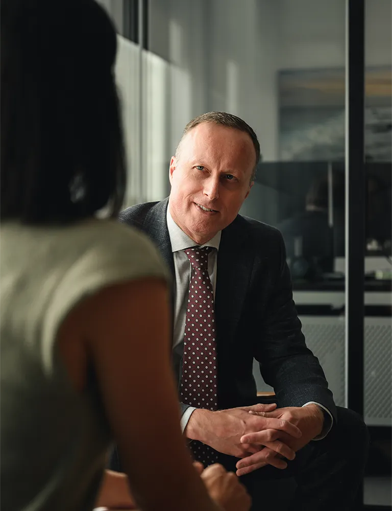 Christopher Bungay, family lawyer at Advantage Family Law, meeting with a client during a consultation